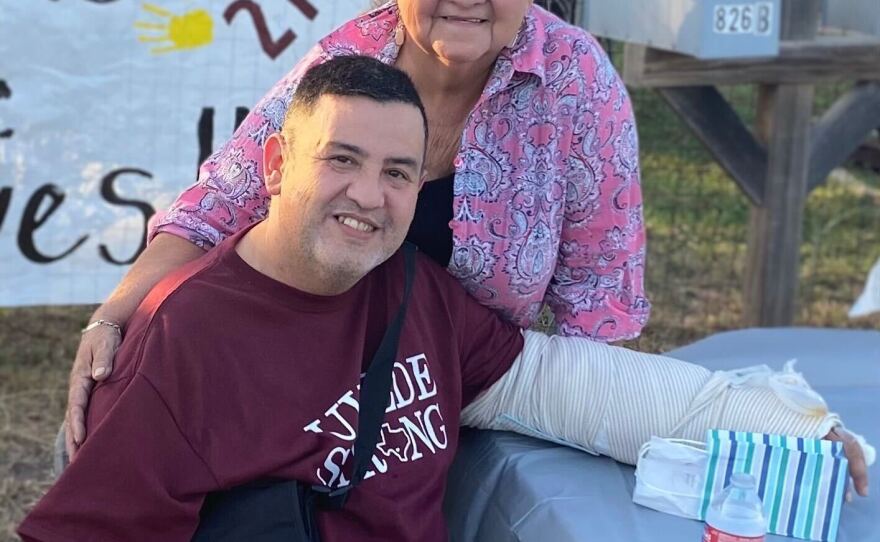 Teacher Arnulfo Reyes and his mother Rosemary Reyes attend an event honoring his return from the hospital after the shooting at Robb Elementary School in Uvalde, Texas.