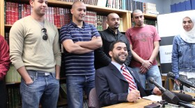 Hanif Mohebi (seated) is the director of the Council on American-Islamic Relations in San Diego, and he is joined by a handful of Egyptian-Americans who expressed their joy at the ouster of Egyptian President Hosni Mubarak. They spoke at the Islamic Center of San Diego, February 11, 2011. 