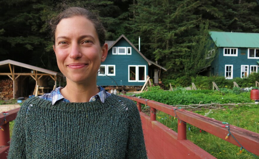 Laura Marcus, founder of The Arete Project, stands in front of the campus, lovingly called the "Hobbit Hole."