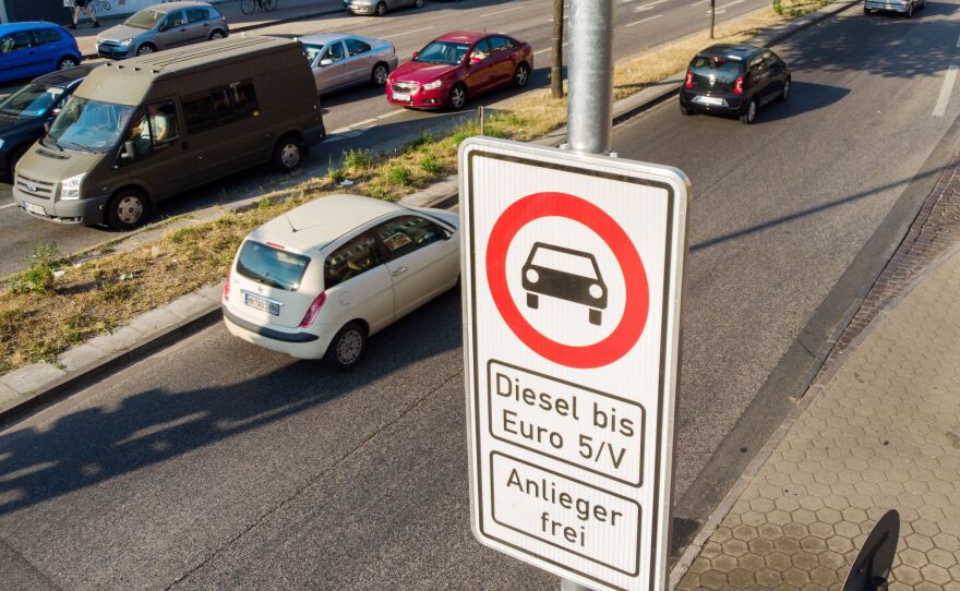 A road sign on Hamburg's Max-Brauer-Allee warns motorists that older diesel vehicles are banned from using this stretch of road. Hamburg is the first German city to ban older diesel vehicles.