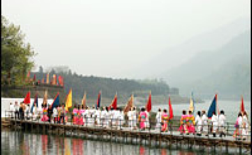 An annual water-releasing festival celebrates Li Bing for figuring out how to control the Min River with an irrigation system called Dujiangyan. This photo also was taken during the April festival.