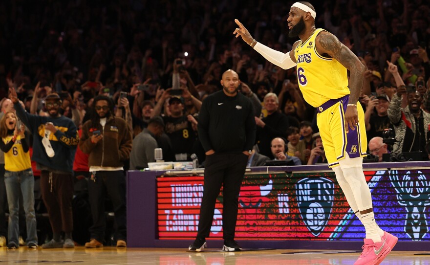 James reacts after scoring to pass Abdul-Jabbar's career record total of 38,387 points against the Oklahoma City Thunder in Los Angeles.
