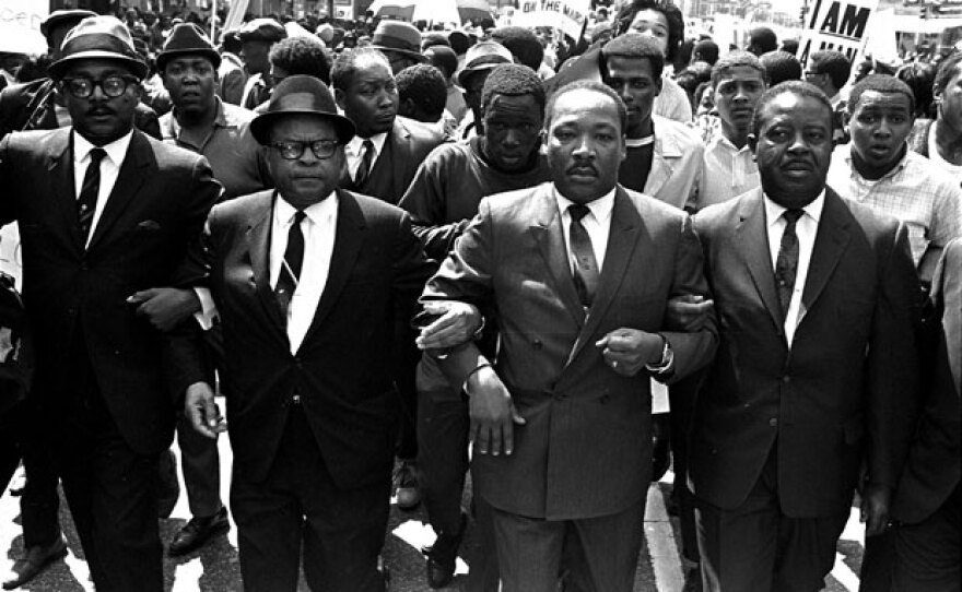 The Rev. Ralph Abernathy, right, and Bishop Julian Smith, left, flank Dr. Martin Luther King, Jr., during a civil rights march in Memphis, Tenn., March 28, 1968.