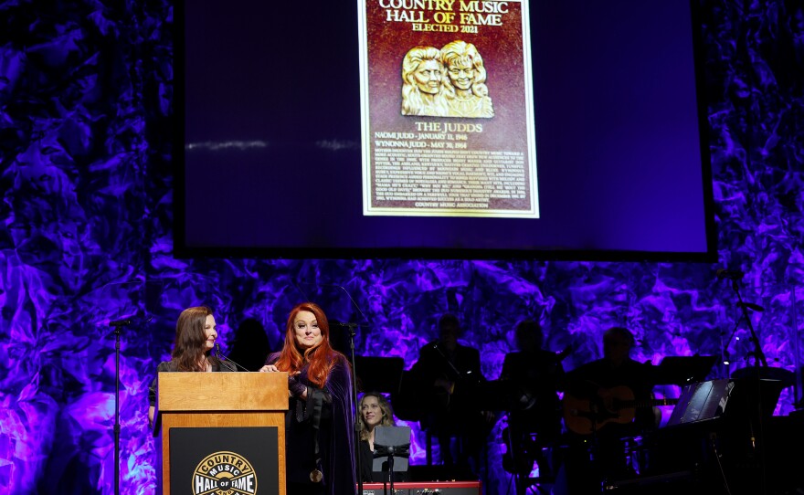 Ashley Judd (left) and Wynonna Judd speak during the medallion ceremony at the Country Music Hall of Fame and Museum on May 01, 2022 in Nashville, Tenn.