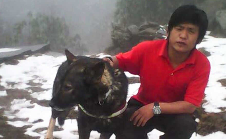 Karna Dura, of SAR Dogs Nepal, is leading the search for Dennis Lee Thian Poh. The team has about 10 men with four dogs.