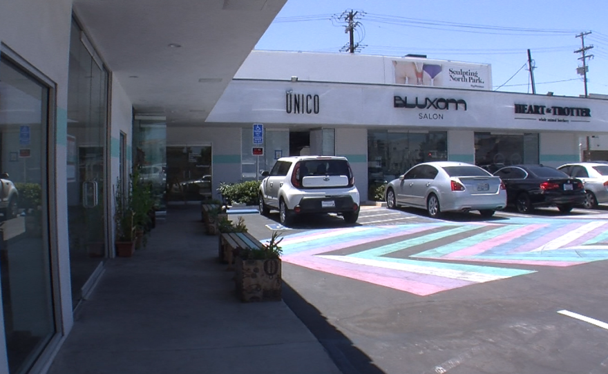 The Boulevard Center, a strip mall on El Cajon Boulevard at Utah Street, becomes a market at night featuring food vendors and music, July 16, 2015.