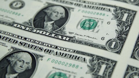 Dollar bills are displayed at the Bureau of Engraving and Printing in Washington, Nov. 15, 2017.