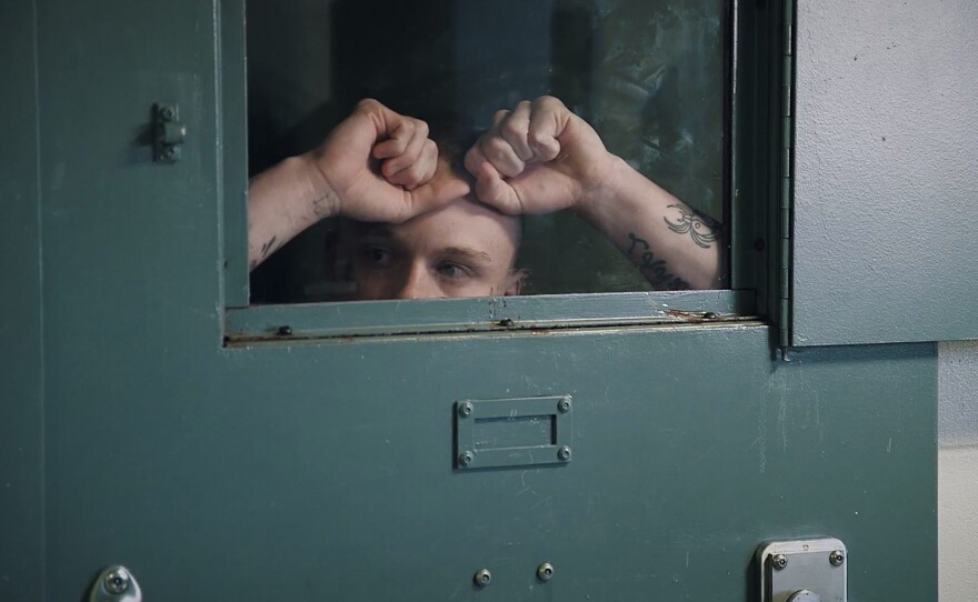 Pictured: A Maine State Prison inmate looking out of his solitary confinement cell window. Follow what happens to recently released prisoners when they go from solitary to the streets. With extraordinary access to the Maine State Prison, the film examines the long-term effects of solitary confinement and efforts to reduce its use.