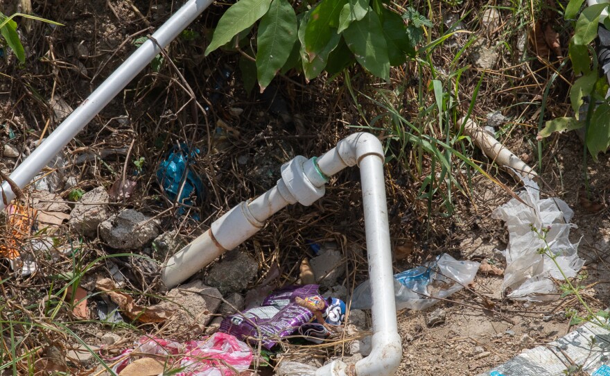 Residents have installed 1-inch plastic pipes to tap into the main water pipeline that runs under the streets of La Paz.