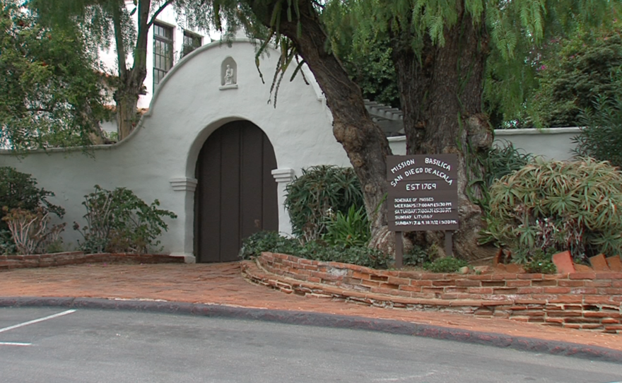 A sign marks the entrance of Mission San Diego, September 22, 2015. 