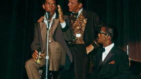 Frank Sinatra, Sammy Davis Jr. and Dean Martin perform on stage together