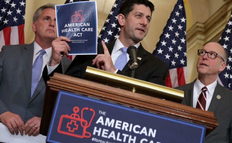 House Speaker Paul Ryan holds a copy of the American Health Care Act, the House Republican leadership's plan to repeal and replace the Affordable Care Act, which is already facing opposition from conservatives in the House and Senate.