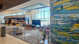 People walk around inside San Diego International Airport's New Terminal 1, Aug. 27, 2025.