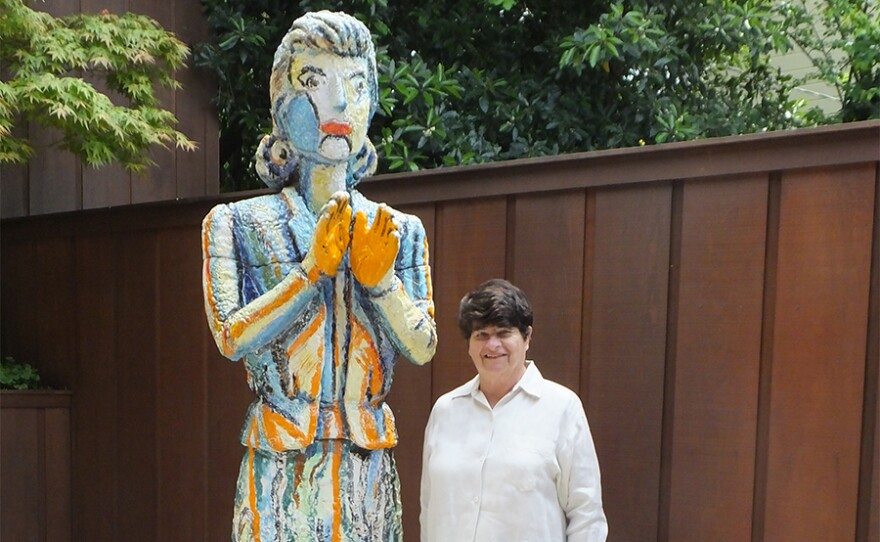 Pictured: Penny Cooper standing next to a Viola Frey sculpture. "Penny: Champion Of The Marginalized" is a multi-dimensional portrait of Penny Cooper, a celebrated criminal defense attorney, art collector, supporter of female artists, and protector of the underdog. Cooper's life brims with stories mirroring the profound changes in our country from the 1940s to the present.