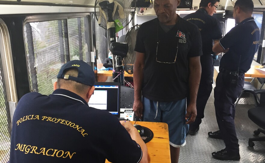 Migrants are processed at an impromptu post on the Costa Rica-Panama border.