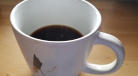 A cup of coffee sits on a counter, March 30, 2018.