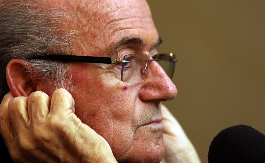 FIFA President Sepp Blatter told a news conference in Colombo, Sri Lanka, on Tuesday that FIFA wasn't responsible for the working conditions of laborers who are building the stadiums for the 2022 World Cup in Qatar. He said the companies that employed the migrant workers should be responsible for their safety.