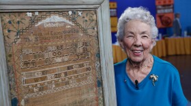 At ANTIQUES ROADSHOW in El Paso, Texas, the proud owner shows off this rare 1787 needlework sampler made by her great, great-grandmother in Andover, Massachusetts and valued at $40,000.