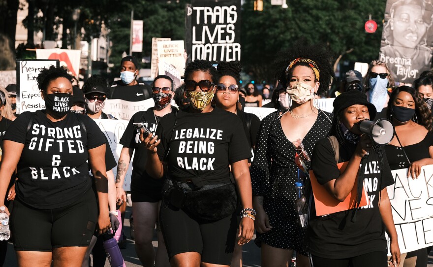 Protesters gather for the Black Women Matter "Say Her Name" march on July 3 in Richmond, Va.
