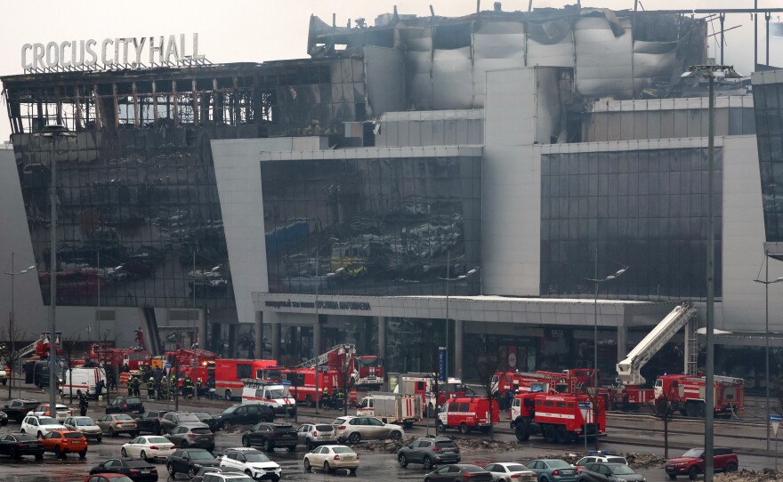 Members of emergency services work at the scene of the gun attack at the Crocus City Hall concert hall in Krasnogorsk, outside Moscow, on Saturday.