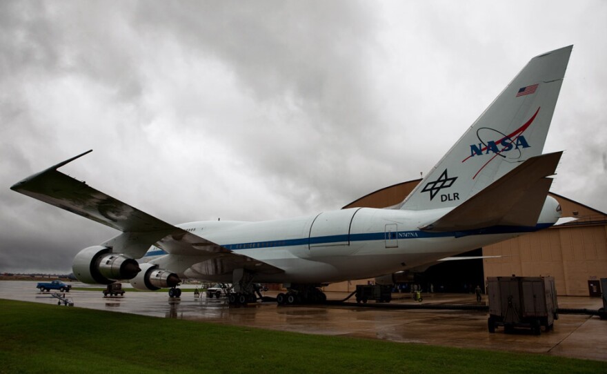 A hatch near the tail of the plane opens to let SOFIA's telescope peer out. The plane-mounted telescope flies above most of the moisture in the Earth's atmosphere, allowing for clearer images than can be captured from ground-based telescopes.