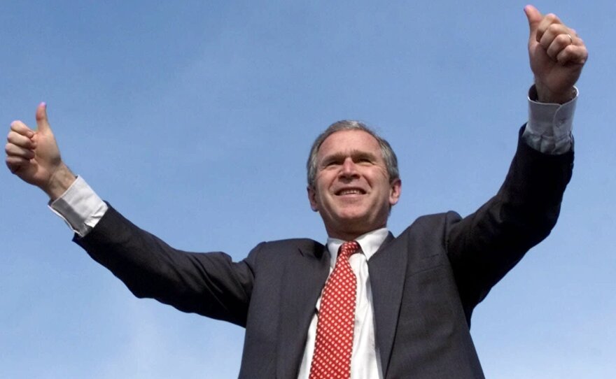 George W. Bush, then as Texas governor, running for president at a rally in Missouri, Oct. 28, 2000. That was days before Bush was put on the defensive when a 24-year-old DUI conviction was revealed.