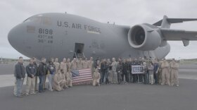 The stars and crew of the Spring 2016 USO tour pose upon returning to the USA after their 8-day, 7-country tour.