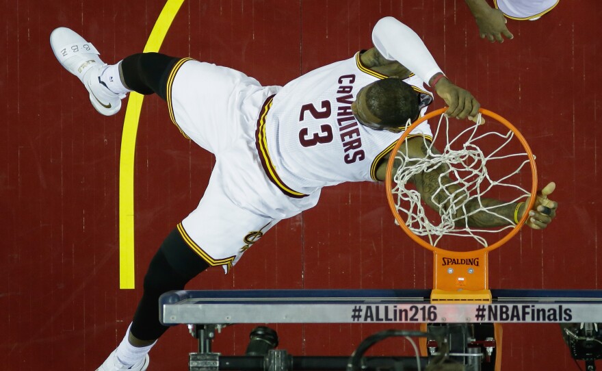 LeBron James of the Cleveland Cavaliers dunks in the first half against the Golden State Warriors in Game 6 of the NBA Finals in Cleveland.