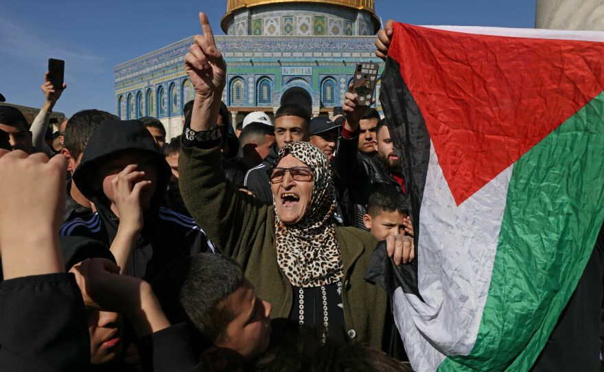 Palestinians protest in the Al-Aqsa mosques compound in Jerusalem on January 27 after one of the deadliest Israeli army raids in the occupied West Bank in years.