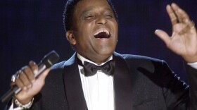 Charley Pride performs during his induction into the Country Music Hall of Fame at the Country Music Association Awards show at the Grand Ole Opry House in Nashville, Tenn. Oct. 4, 2000.