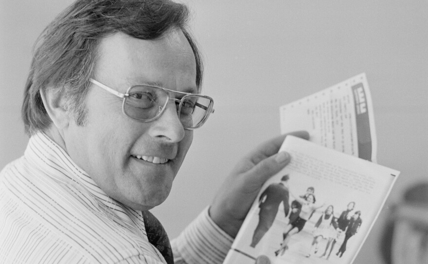 Associated Press photographer Slava "Sal" Veder holds a copy of his Pulitzer Prize-winning picture and a congratulatory telegram from Wes Gallagher, then-AP president and general manager, in San Francisco on May 7, 1974.