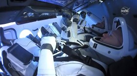 A screenshot of NASA astronauts Bob Behnken and Col. Doug Hurley aboard the SpaceX Dragon Endeavor. August 2, 2020.