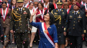 Peruvian President Keiko Fujimori walks to the presidential palace after her inauguration in Lima, Peru, Tuesday.