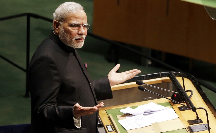 Narendra Modi, Prime Minister of India, speaks at the UN General Assembly in New York City Saturday. Addressing the question of peace talks with Pakistan, Modi said they must happen "without the shadow of terrorism."