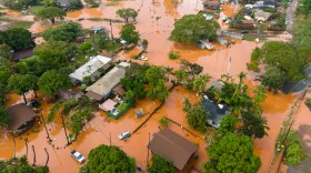 Fooding covers a residential neighborhood in Waialua, Hawaii, Friday, March 20, 2026.