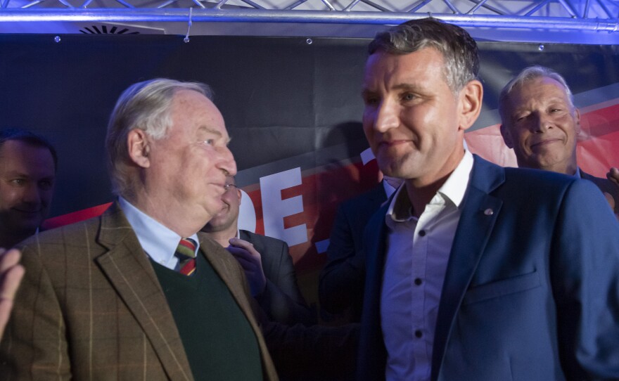Alternative for Germany leaders Björn Höcke (right) and Alexander Gauland celebrate their party's election results in Erfurt, Germany, in 2019, when voters in Thuringia elected a new state parliament. The AfD now has 88 members in Germany's federal parliament, more than 12% representation.