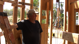 Dan Eubank, 64, works on rebuilding his San Marcos-area home, May 11, 2015. It was destroyed in the Cocos fire in May 2014.