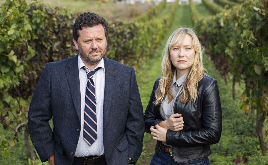 Neill Rea as Mike and Fern Sutherland as Kristin in BROKENWOOD MYSTERIES.