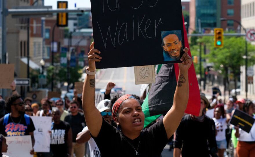 Demonstrators gather outside Akron City Hall on July 3 to protest the killing of Jayland Walker.