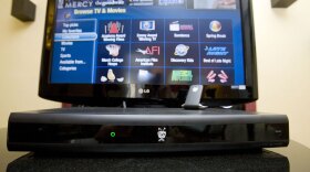 TiVo is trying to re-establish its place in the digital recording world with a new box, called TiVo Premiere, that draws video from a variety of sources, including cable, satellite and the Internet.