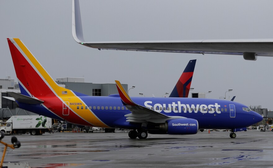 A Southwest plane taxis at the Seattle-Tacoma International Airport in Seattle.