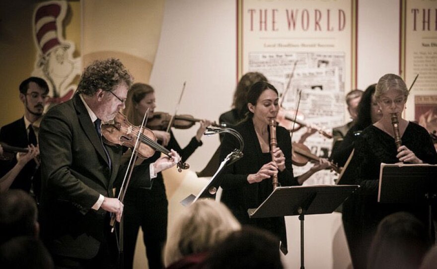 Bach Collegium musicians use early and modern instruments to perform in an undated photo.