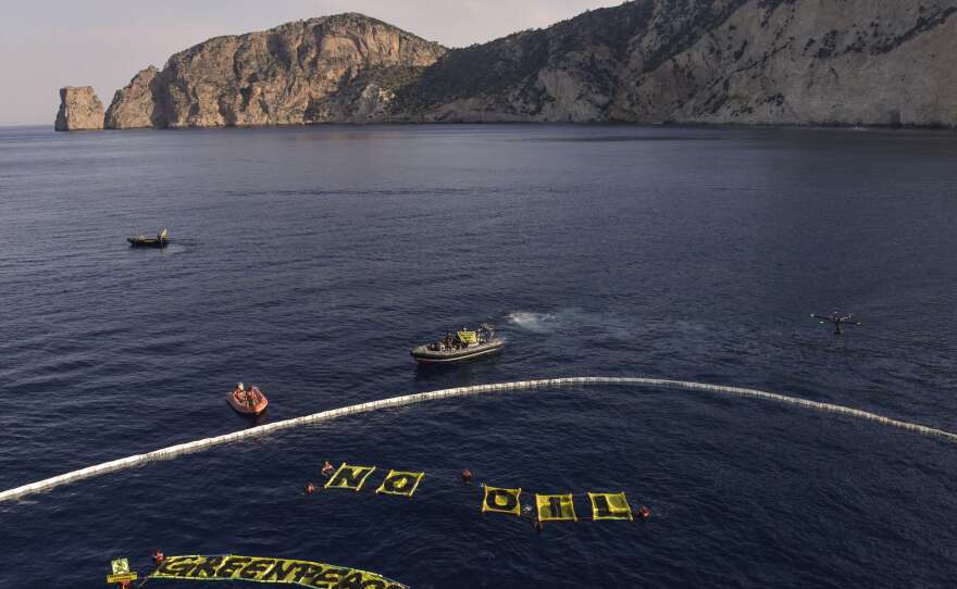 Greenpeace environmental activists protest oil exploration in the waters near the Spanish island of Ibiza on June 11.
