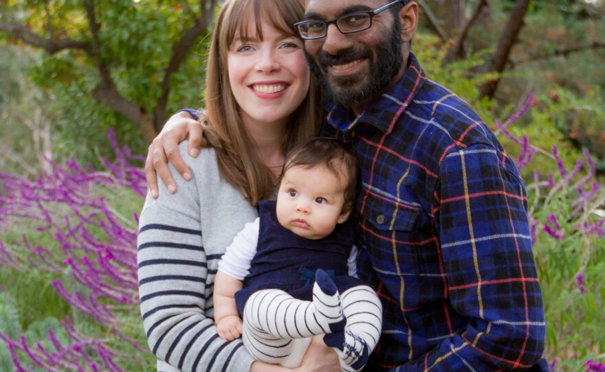 Dr. Lucy Kalanithi and Dr. Paul Kalanithi with their daughter, Elizabeth Acadia.