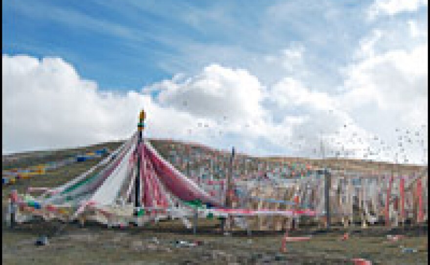 Prayer flags dot mountains in the area, a reminder of the traditional Tibetan way of life.