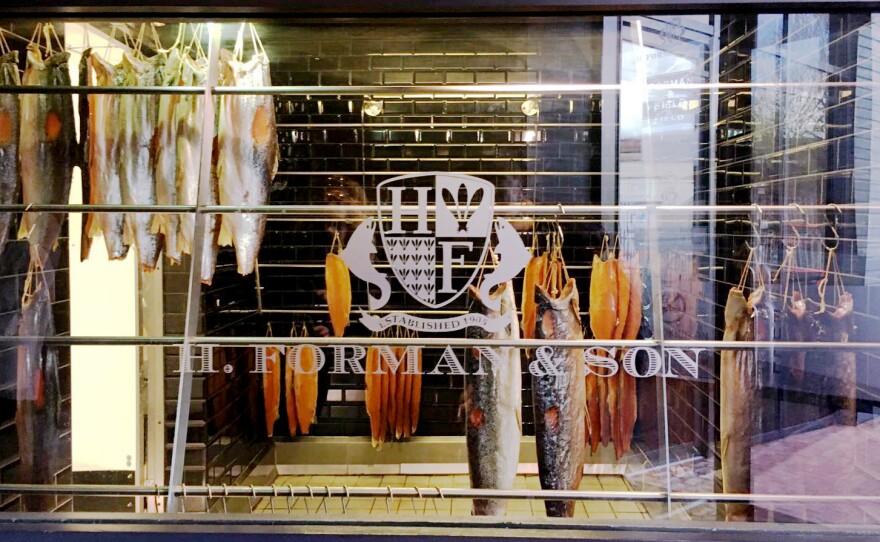 Fillets of smoked salmon hang in the smokehouse of H. Forman & Son, founded in 1905. Its owner, Lance Forman, says he'll vote to leave the EU despite the risks it poses to his bottom line.