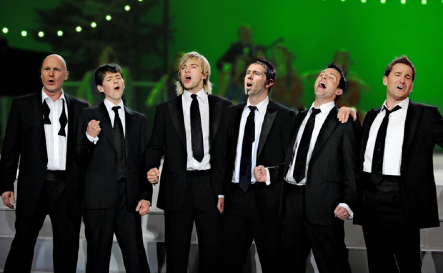 Celtic Thunder, left to right: George Donaldson, Damian McGinty, Keith Harkin, Neil Byrne (Celtic Thunder's guitarist), Ryan Kelly and Paul Byrom