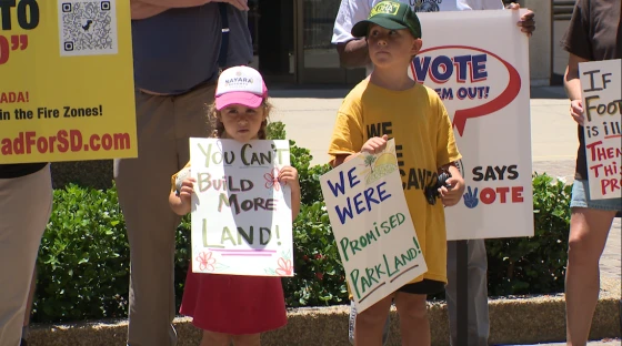 Protesters gather outside the San Diego City Administration Building before an appeal hearing on Tuesday, July 7, 2026.