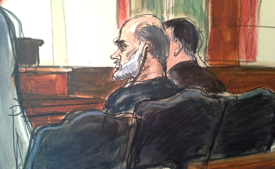 Osama bin Laden's son-in-law, Sulaiman Abu Ghaith (center), pleaded not guilty to a charge of conspiracy to kill Americans on March 8. He is set to appear in a federal court Monday.