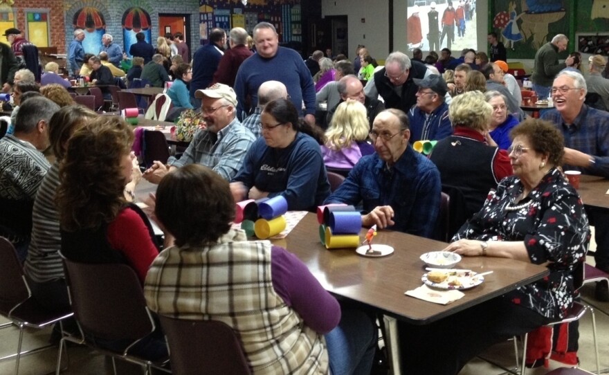 Hundreds of northern Maine residents recently held a spaghetti supper fundraiser to help Russell Currier's parents get to Sochi.